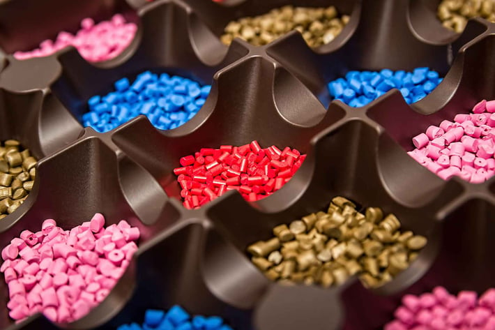 Various Colored Plastic Pellets - Shutterstock